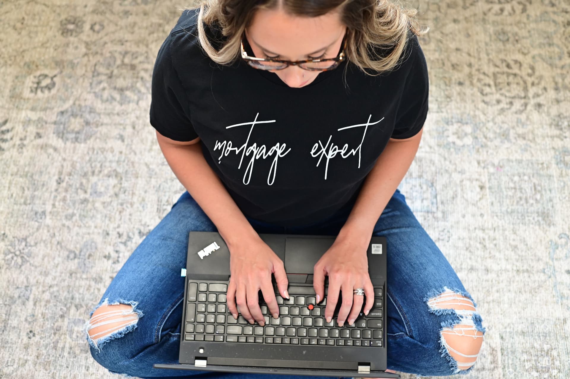 Michelle Carn working on her laptop
